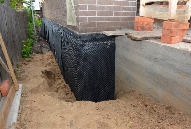 SJ Waterproofing Pros technician performing targeted Vapor Barrier Installation assessment in Piney Flats, TN